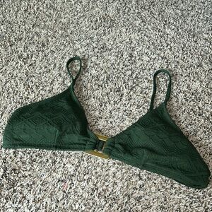 Green bikini top with gold detail in the front